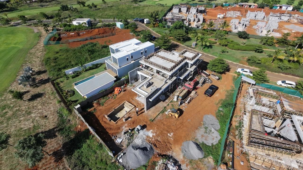 Aerial view of villas at structure stage